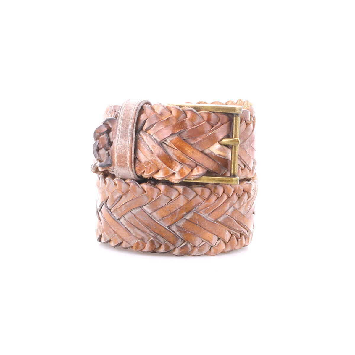 The Bed Stu Proem is a coiled brown handwoven leather belt with a vintage metal buckle, shown on a white background for a rustic, casual look.