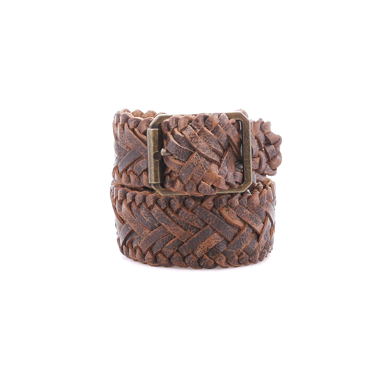 The Bed|Stü Proem belt, handwoven in rich brown leather with a vintage metal buckle, is coiled neatly against a plain white background, highlighting its exquisite artisan craftsmanship.