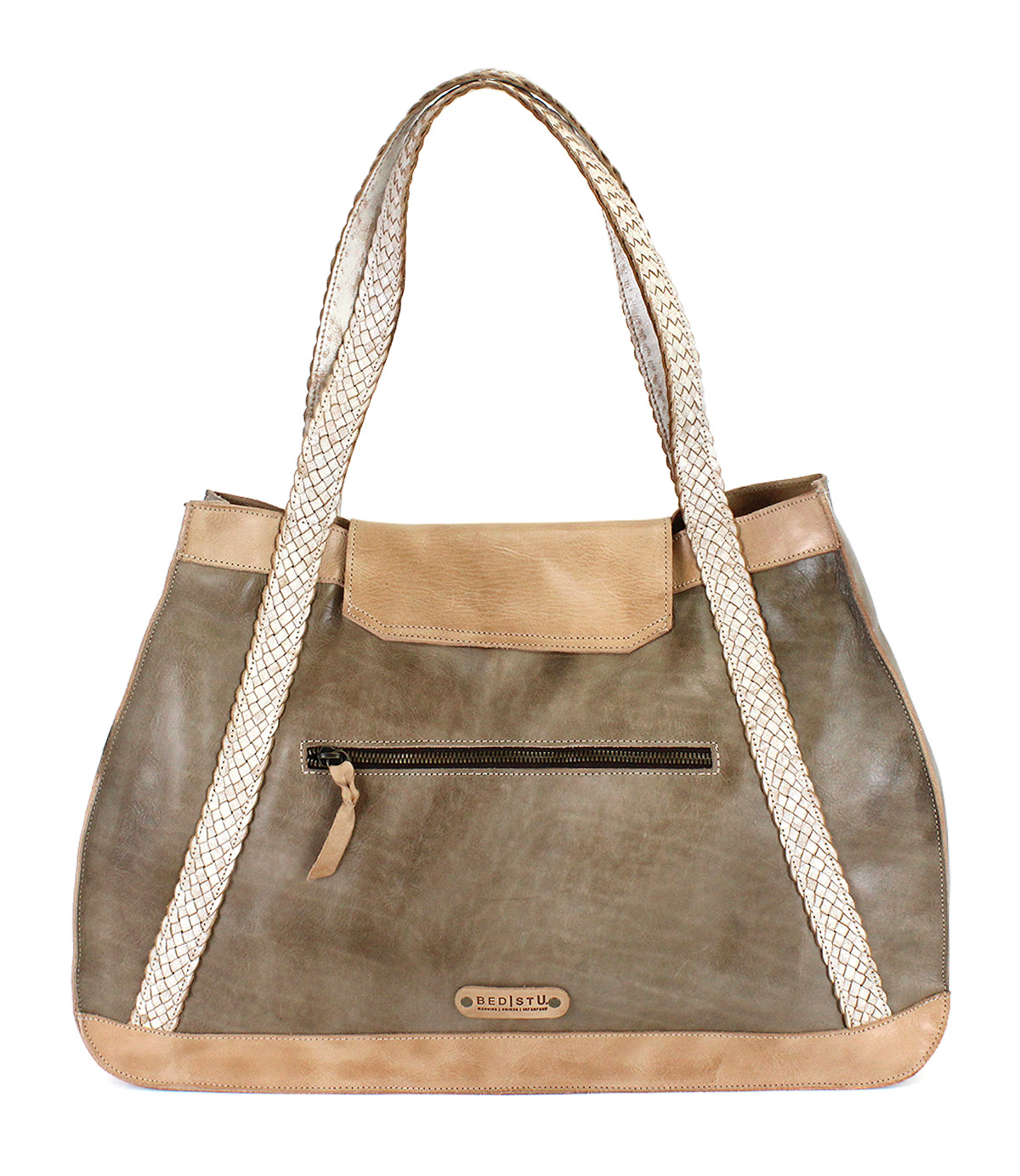 The Proper by Bed|Stü is a taupe leather handbag featuring handwoven cream straps, an organic cotton-lined interior, a front zip pocket, and a small metal Bed|Stü brand plate at the bottom center.