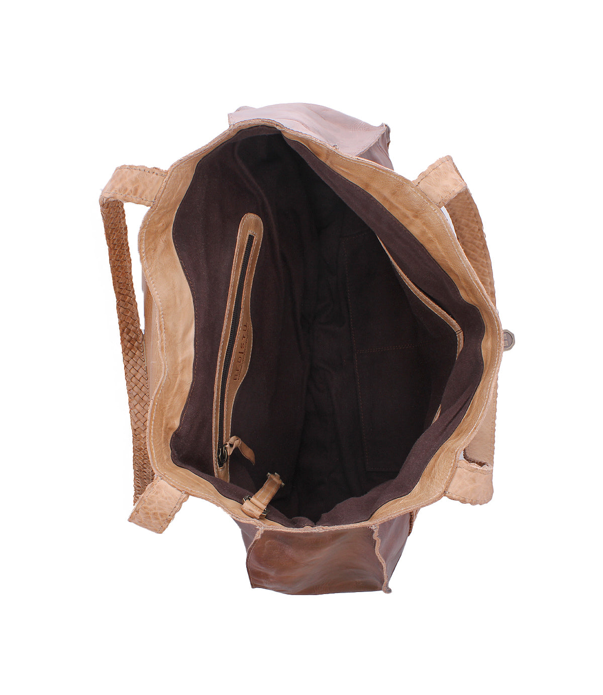Top-down view of an open Proper by Bed|Stü, showing a brown vegetable-tanned leather exterior, zipper pocket, and spacious dark-lined interior.
