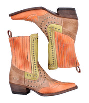 The "Raise" boots by Bed Stu feature vibrant Western-inspired orange, green, and brown leather designs with fringe details and metal studs, showcasing signature stitching. Displayed sideways.