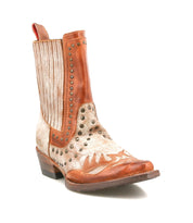 The Bed Stu Raise is a brown and beige leather Western-inspired boot featuring decorative stitching, studded accents, a low heel, and a snip toe for timeless style.