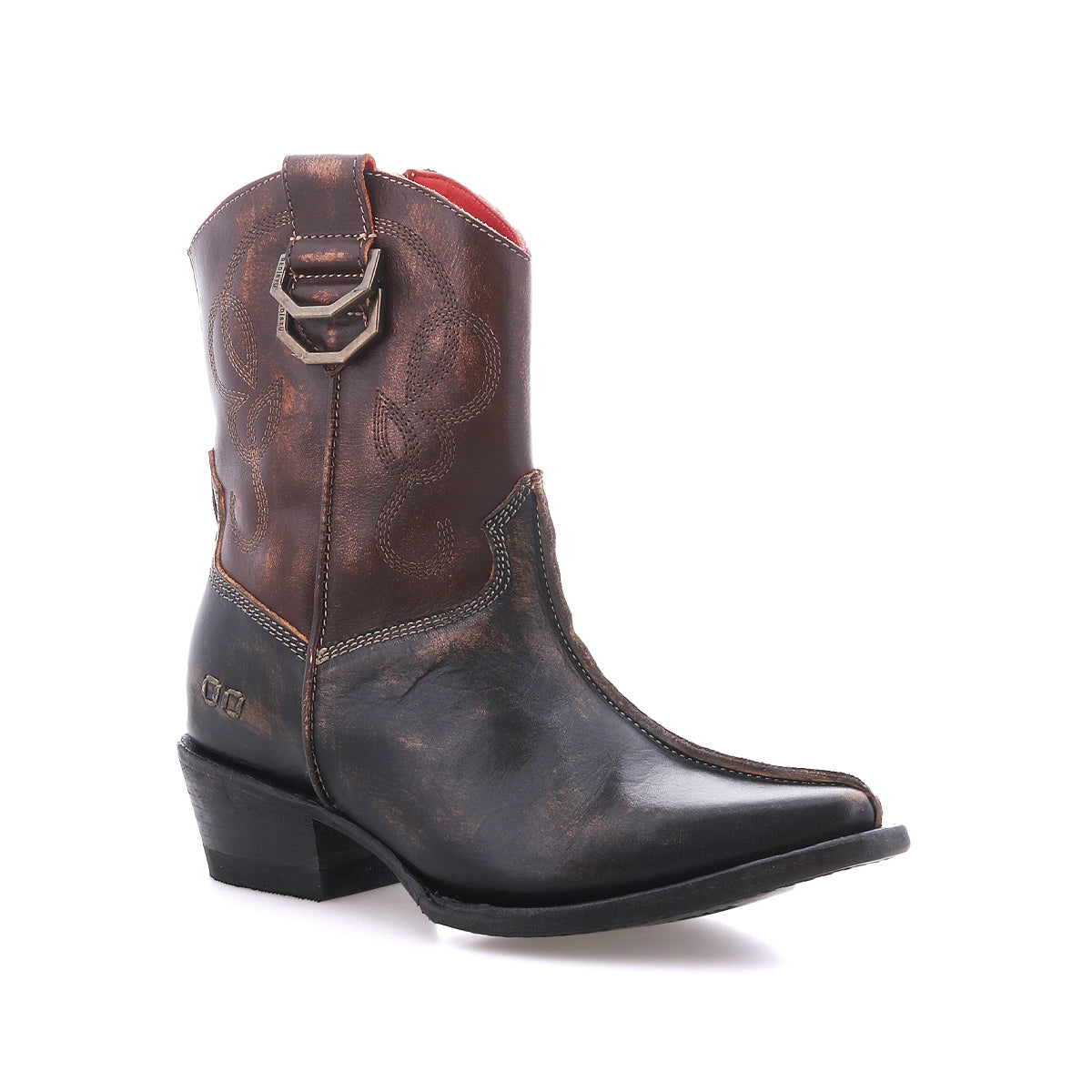 The Bed|Stü Rangeley is a single brown leather cowboy boot featuring decorative stitching and dual D-rings forming a distinctive design near the top, finished with a pointed toe and photographed against a white background.