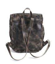 The Bed Stu Ranger is a sturdy distressed brown leather backpack with two adjustable shoulder straps, a top handle, visible stitching, and a side vertical zipper pocket—ideal for everyday use.