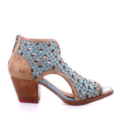 A single handmade Bed Stu Ransom peep-toe high heel shoe with woven blue details on a white background.