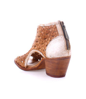 Brown vegetable tanned leather peep-toe bootie with a chunky wooden heel, featuring a side zipper, isolated on a white background by Bed Stu's Ransom.