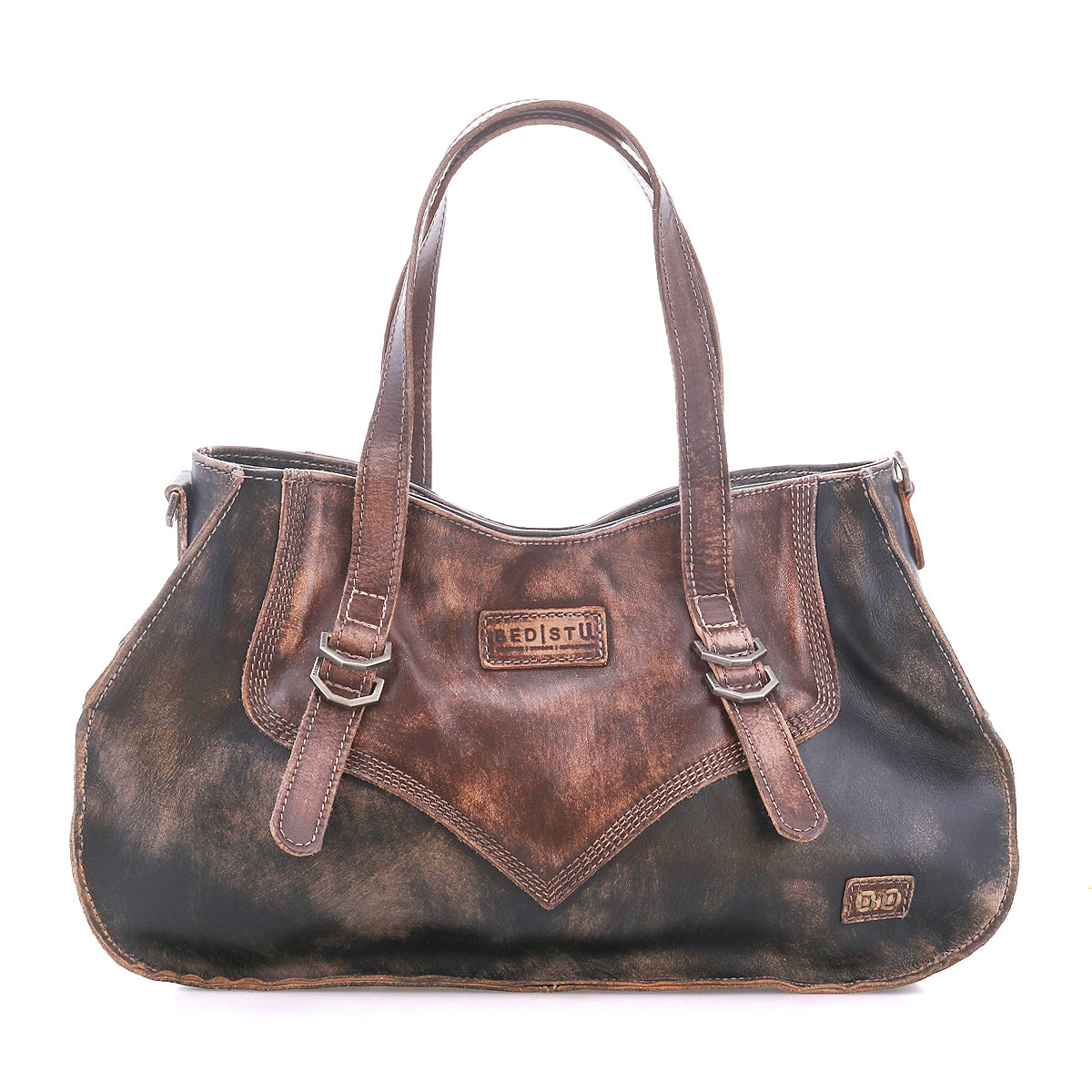 Inspired by heritage style, the Redrock by Bed Stu is a compact brown and black distressed leather bag with double handles, buckled straps, and a front "Bed Stu" patch—ideal for daily use.