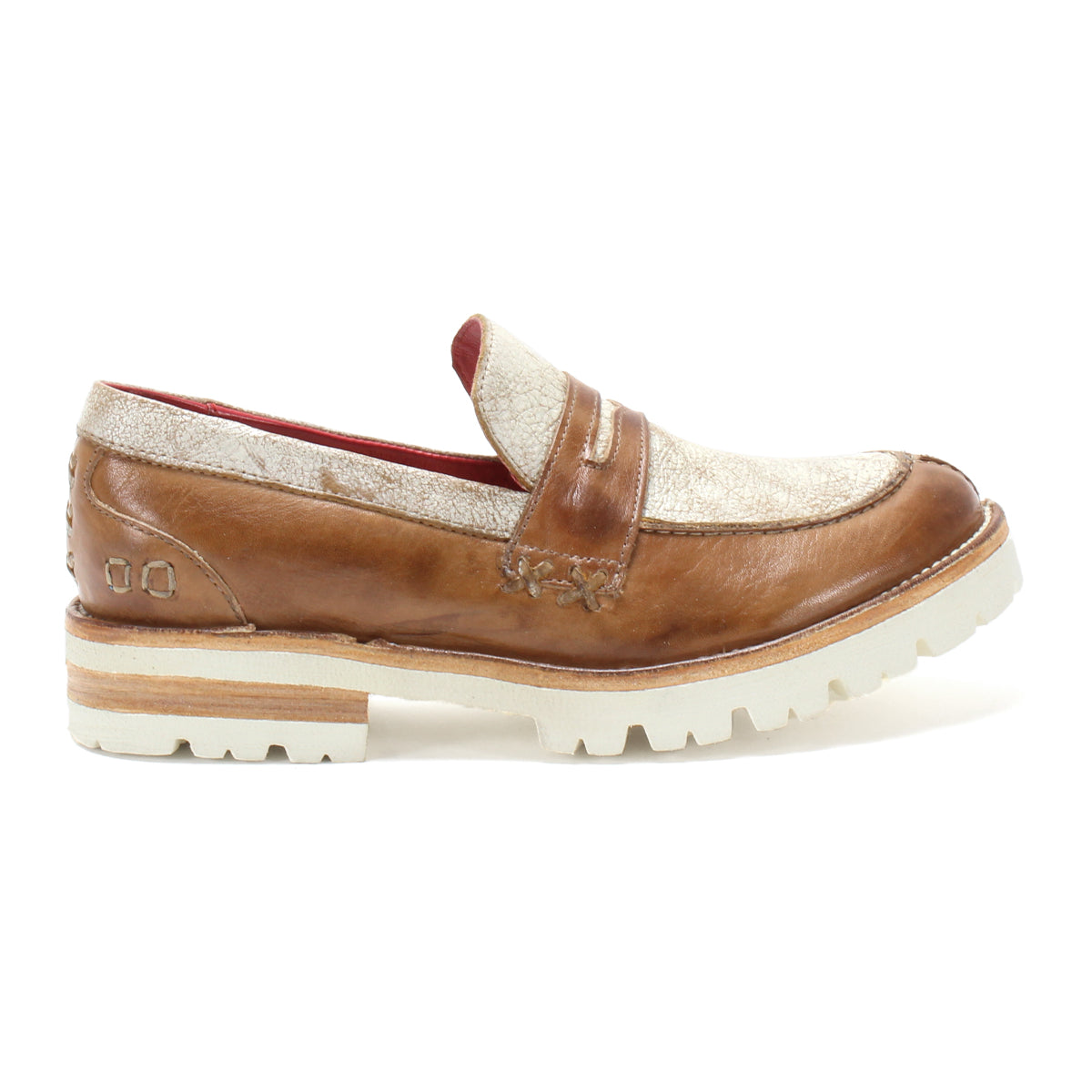 The Bed Stu Reina III is a leather penny loafer for men, featuring tan and white soles and providing all-day comfort.