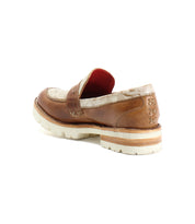 The Bed Stu Reina III is a men's leather penny loafer in tan and white, offering all-day comfort.