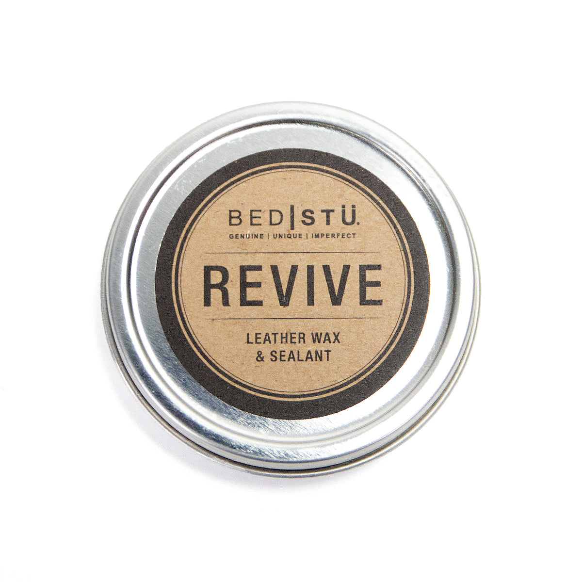A tin of Bed Stu Revive Leather Wax and Protective Barrier against a white background.
