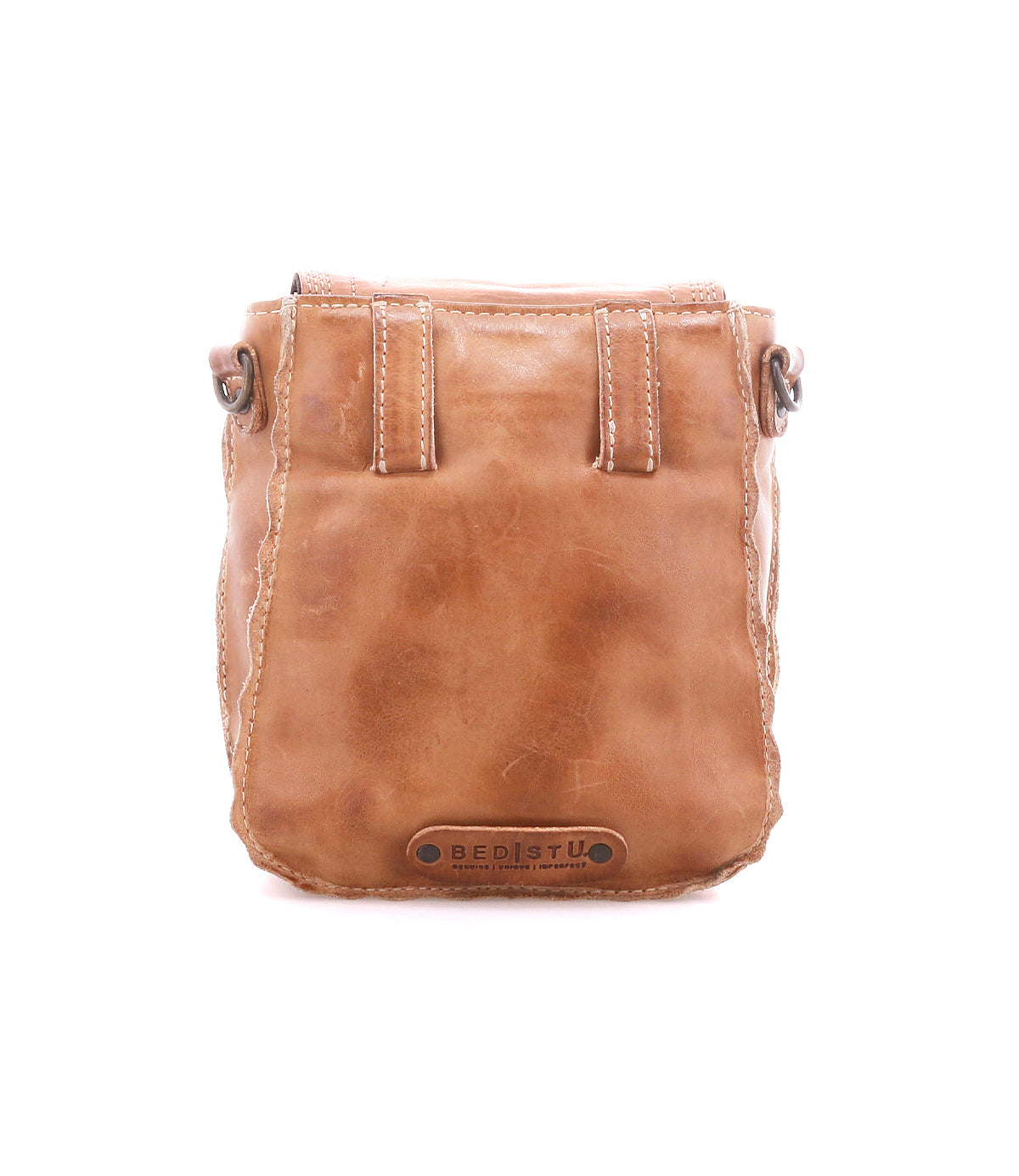 Back view of the Bed|Stü Rhyme, a tan leather compact crossbody bag with a flap closure.