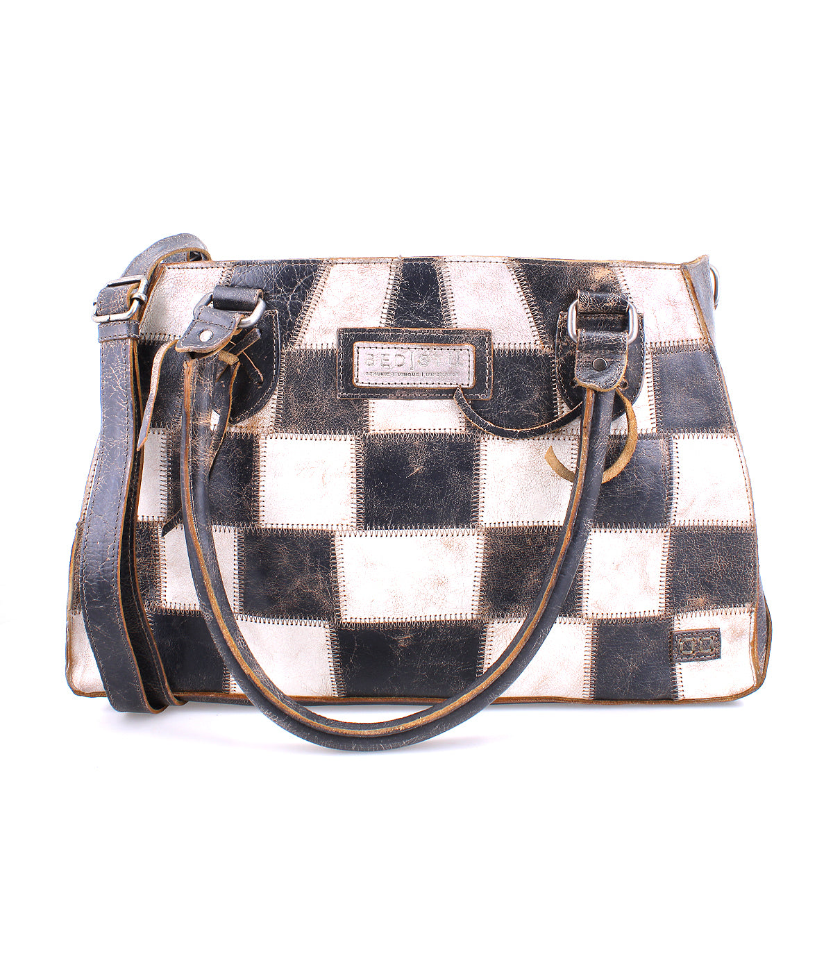 A sustainable, checkered Rockababy SL handbag with brown leather trim and handles on a white background by Bed Stu.