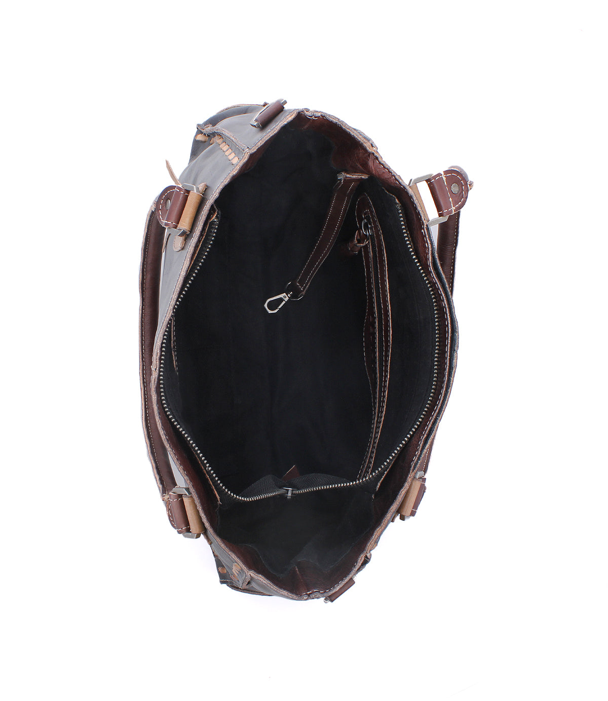Top view of the open Bed|Stü Rockababy handbag, featuring handcrafted, rich vegetable-tanned leather with visible stitching and metal hardware; showcases a spacious main compartment, an inner zip pocket, and a smaller pouch inside.