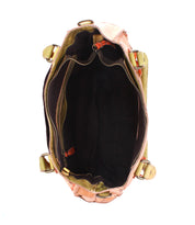 Top view of an open Bed Stu Rockababy leather bag, featuring multiple compartments and zippers with a spacious interior—a perfect mix of style and functionality for everyday use.