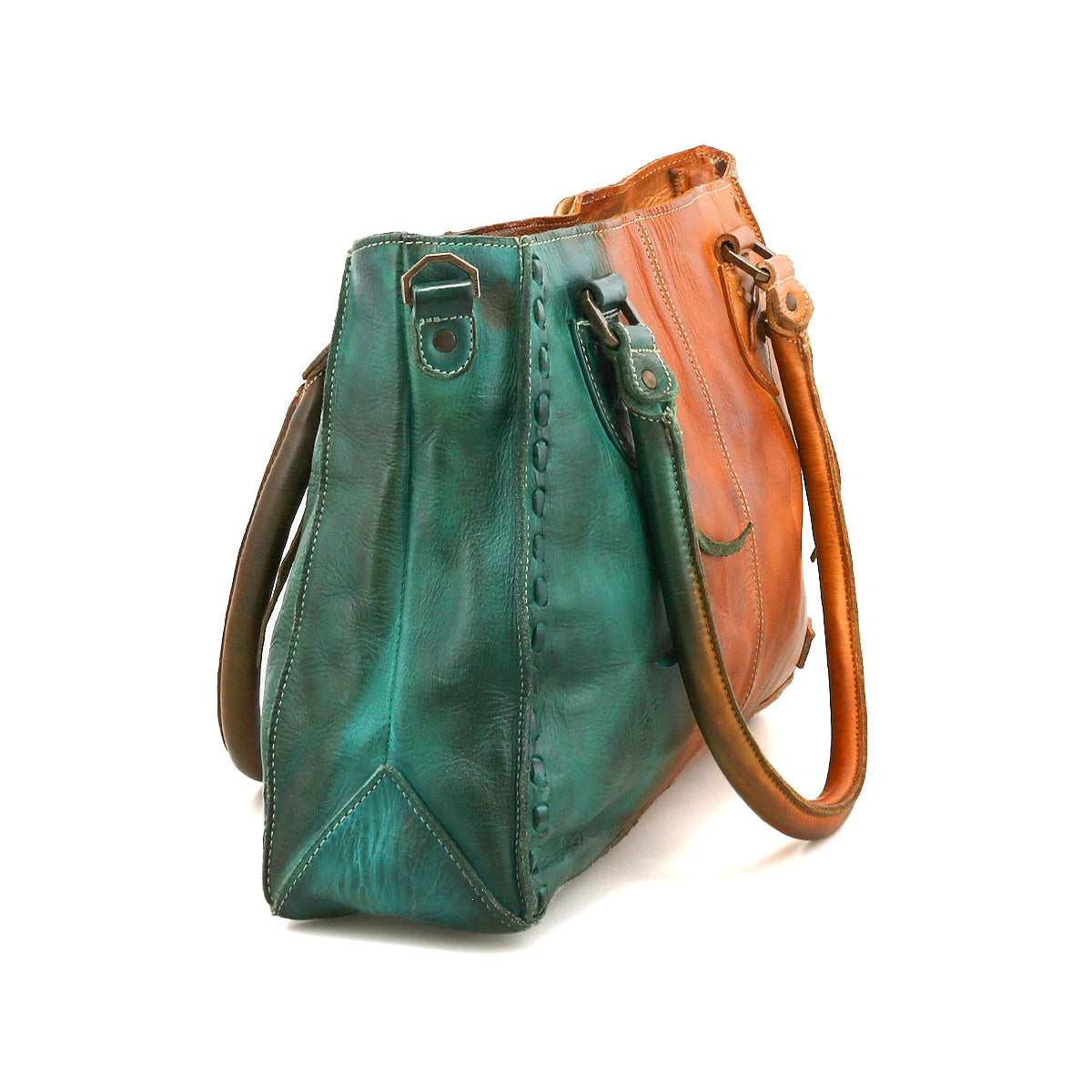 The Rockababy by Bed Stu is a compact leather bag with teal and tan sides, two handles, stylish stitching, and a convenient crossbody strap for versatile everyday use.