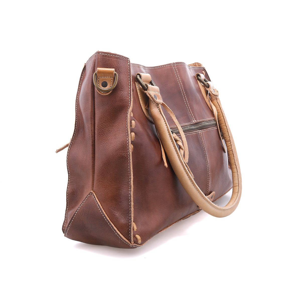 The Bed Stu Rockababy is a compact brown leather handbag with tan handles, visible stitching, and a side zipper pocket. Includes an adjustable crossbody strap—ideal for everyday essentials. Shown on a white background.