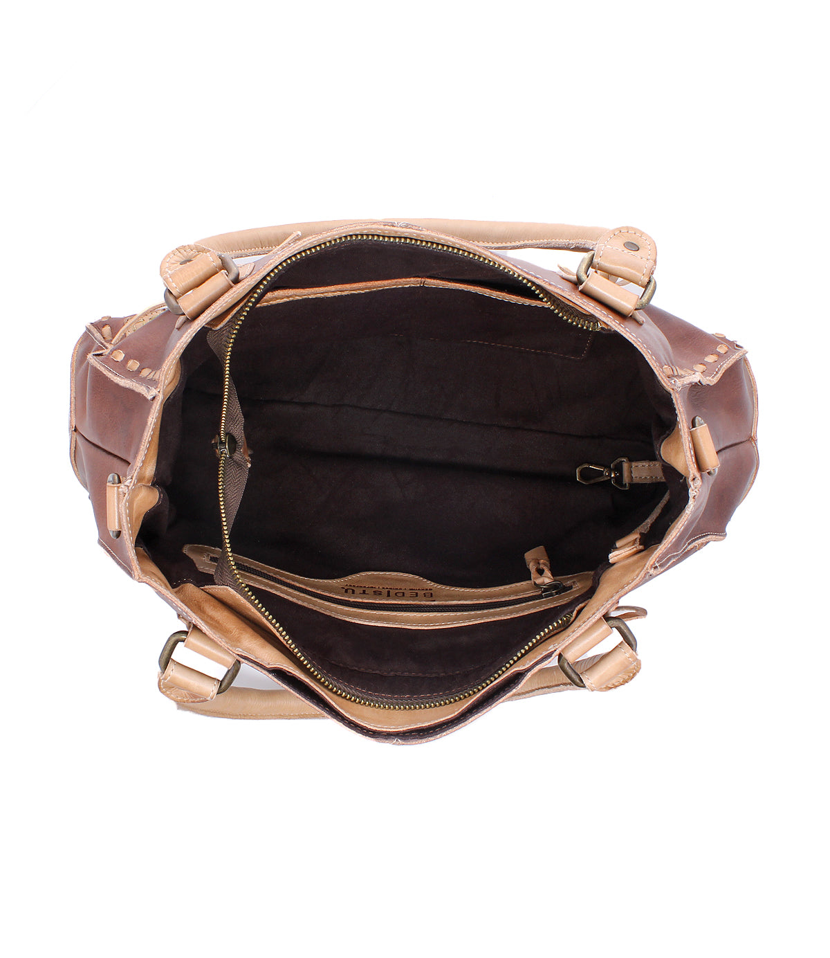 Top view of the Bed Stu Rockababy—a compact leather bag featuring interior compartments, a zippered pocket, key clip, and adjustable crossbody strap—ideal for carrying your daily essentials.