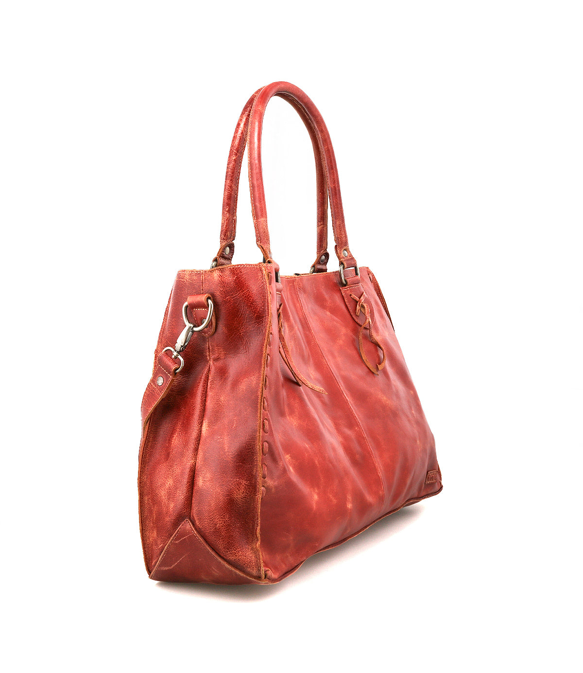 The Bed Stu Rockaway is a large red leather handbag with double handles, side rings, visible stitching, and a zip-pocket divider. This best-seller is shown on a white background.