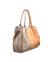 The Bed Stu Rockaway is a large leather handbag with two handles, a zip-pocket divider, and a gradient color fade from gray on the left to tan on the right.