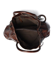 Explore the versatility of our top-selling bag, "Rockaway" by Bed Stu: featuring an open brown leather design with a roomy interior that includes multiple compartments and zipper pockets.