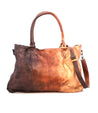 A brown leather Bed Stu ROCKAWAY tote bag on a white background.