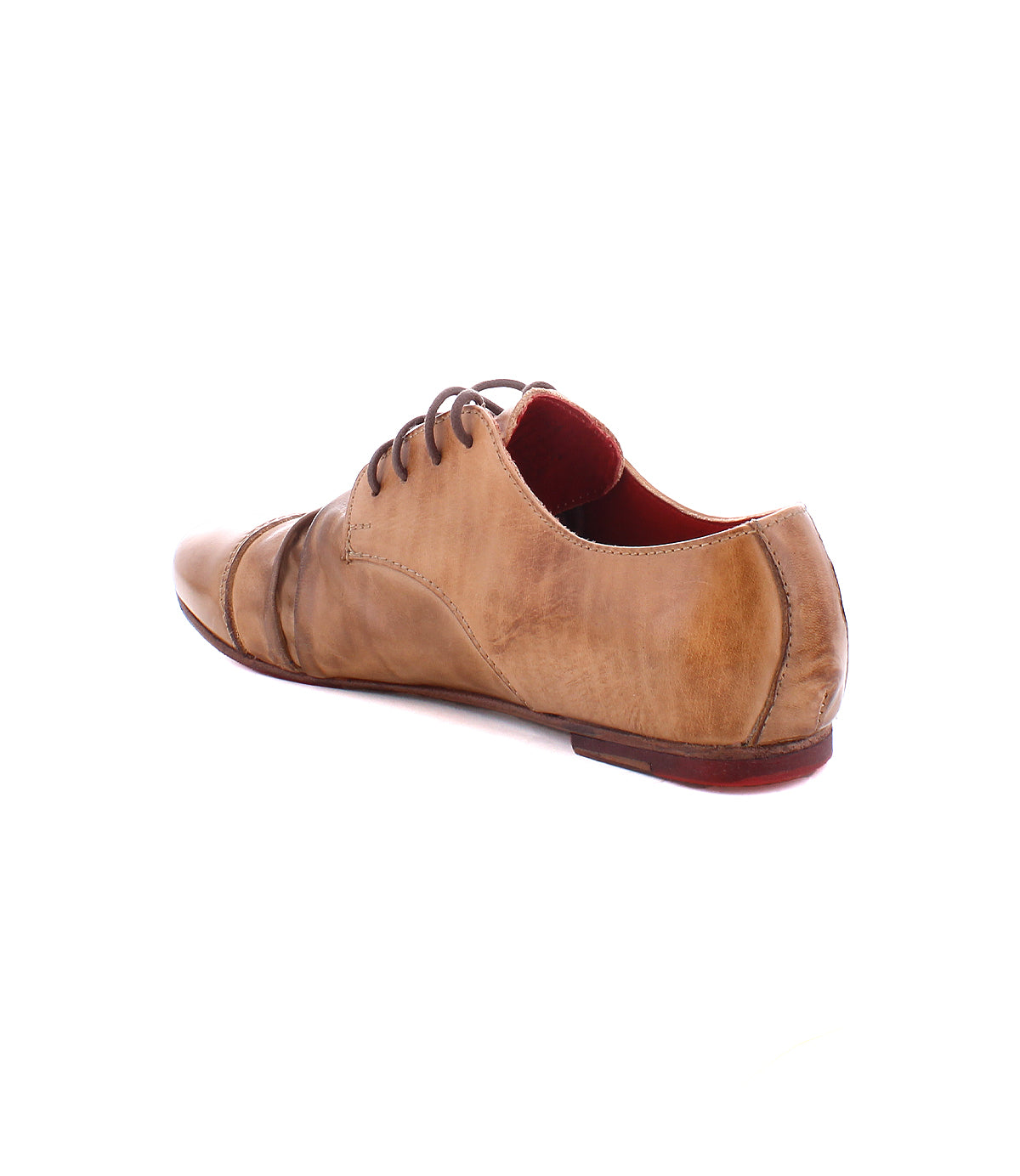 A light brown, worn leather oxford shoe with a 1920s wingtip flair and laces, shown from the back-right angle against a white background. The shoe is the Rumba II by Bed Stu.