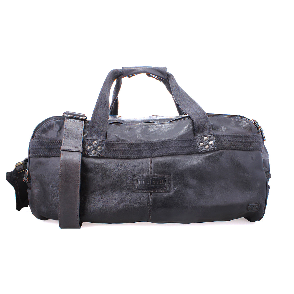 A black leather duffle with durable canvas straps, dual handles, a shoulder strap, and multiple compartments by Bed Stu called Ruslan.