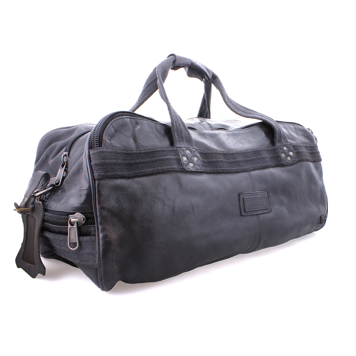A black leather duffel bag with handles, durable canvas straps, and a zipper closure, featuring an organic cotton lining, Bed Stu's Ruslan.