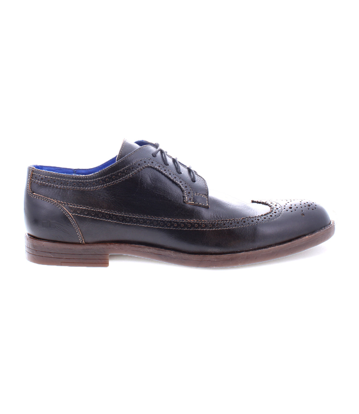 Sandro II, by Bed Stu, is a handcrafted leather men's office shoe showcasing a black leather wingtip toe with decorative brogue details, lace-up design, and brown sole from the side view.