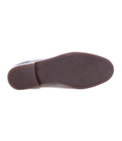 The Sandro II by Bed Stu features a brown handcrafted leather design for men's office wear. The bottom view showcases a sole with a slight heel adorned with intricate brogue details.
