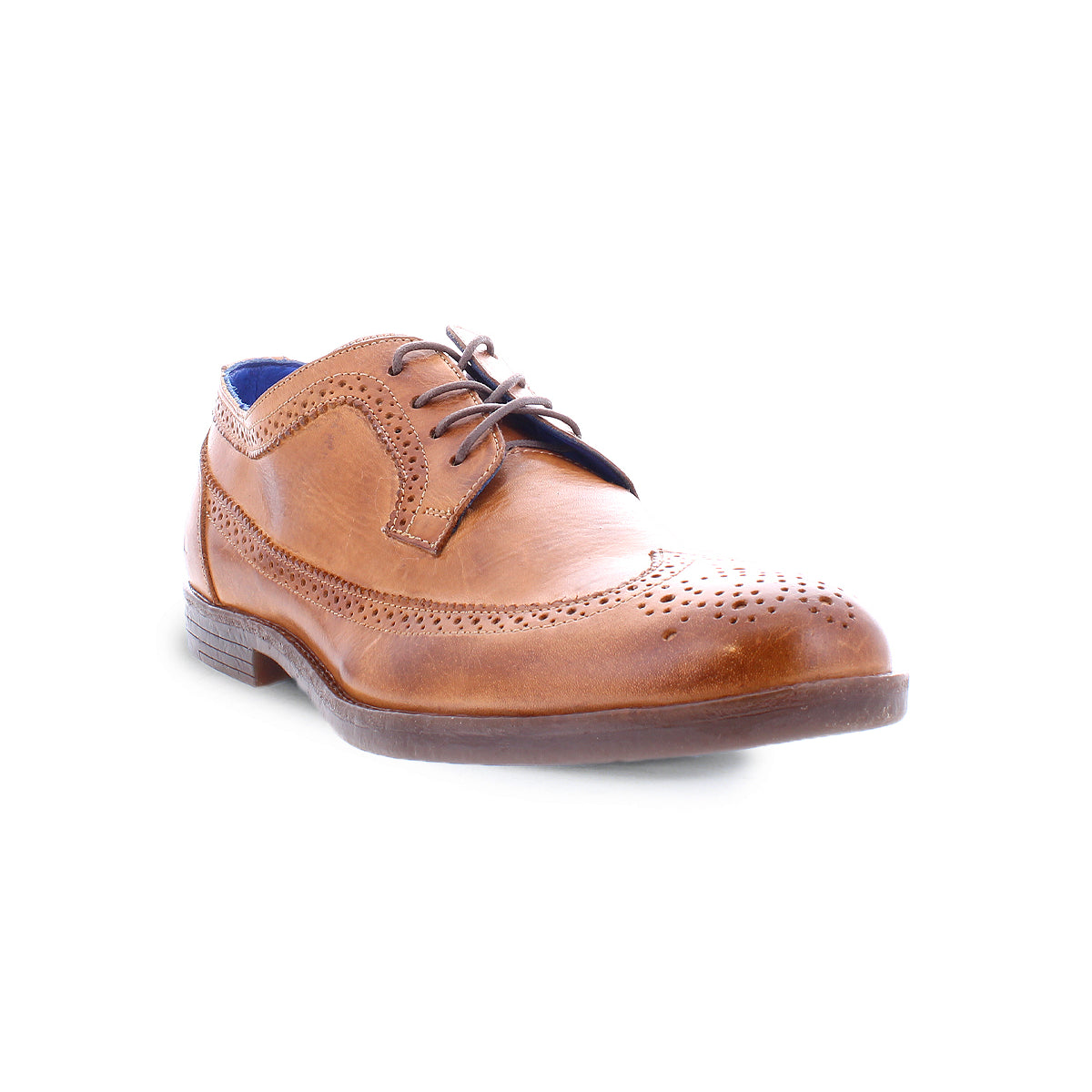 The Sandro II by Bed Stu is a brown leather brogue shoe featuring a wingtip toe design, decorative perforations, dark laces, and a low heel. It's an ideal men's office shoe for those who appreciate timeless style and elegance.