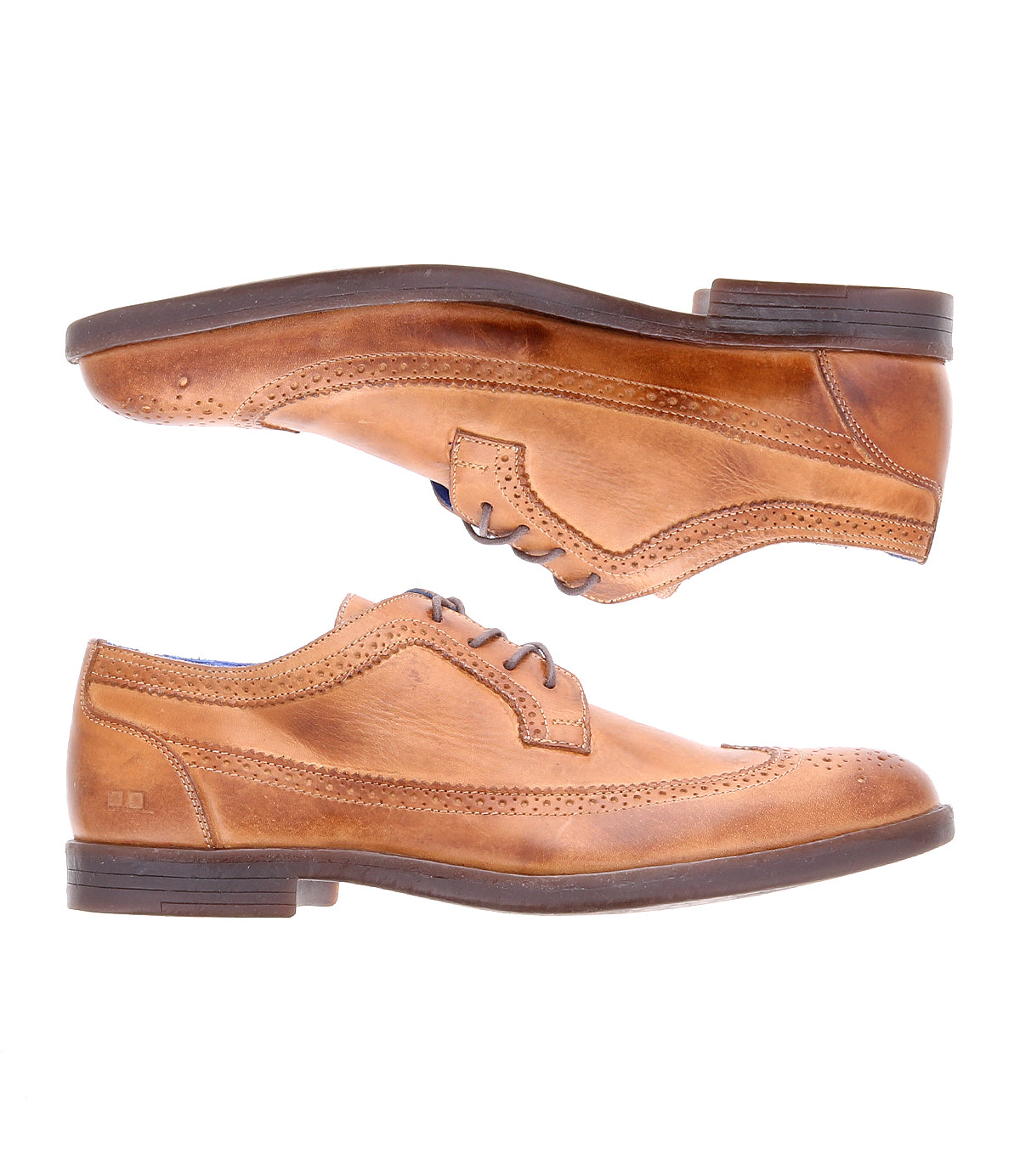The Sandro II by Bed Stu are two tan leather dress shoes with brogue details and handcrafted leather, featuring decorative perforations, laces, and dark soles, viewed from the side against a white background.