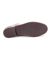 The image displays the bottom view of the Sandro II by Bed Stu, a men's office shoe crafted from handcrafted leather, featuring a smooth sole and small heel.
