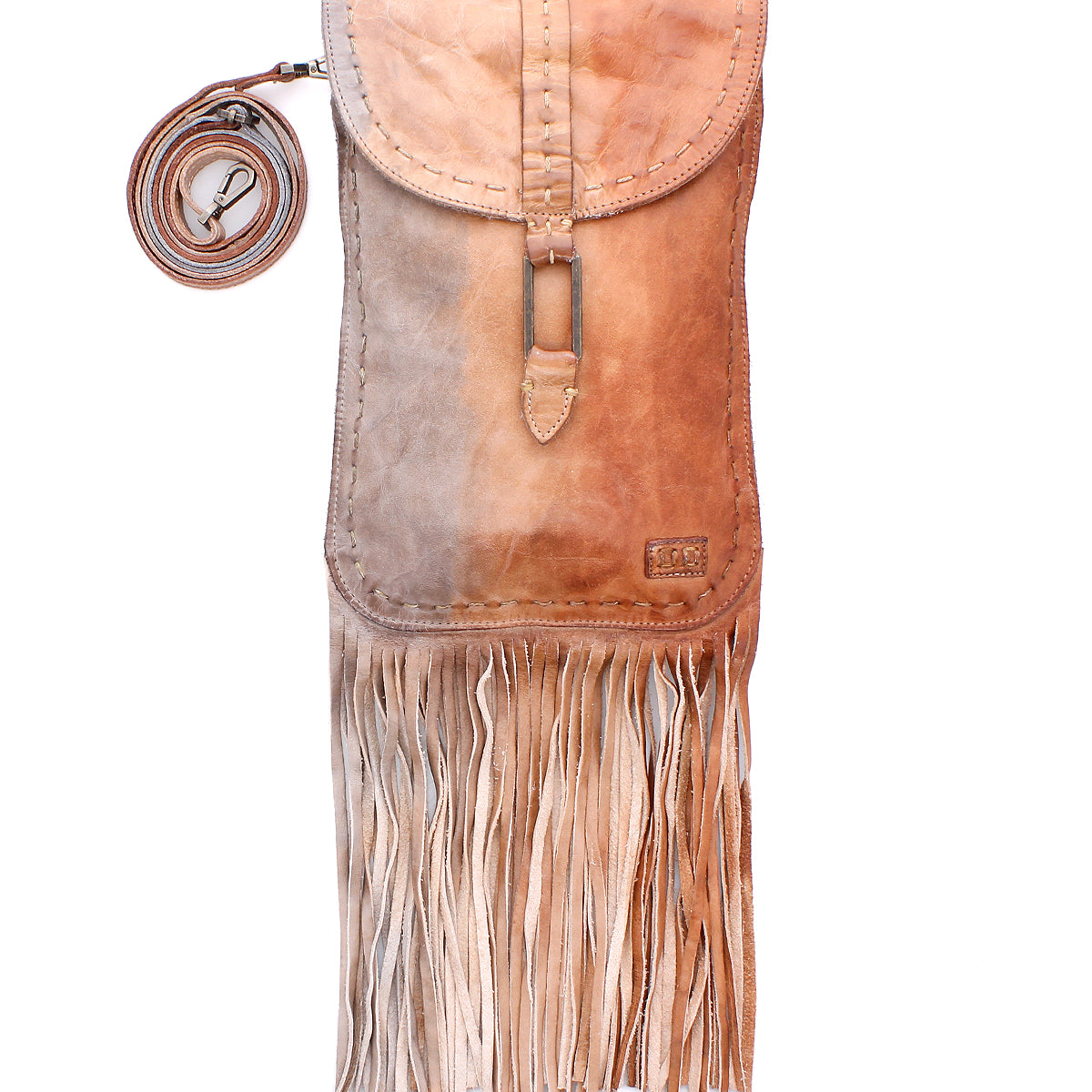 The Bed Stu Sandy Lane II is a handmade crossbody bag in rich brown vegetable-tanned leather, featuring a flap closure, decorative stitching, long bottom fringe, and a detachable strap coiled beside it.