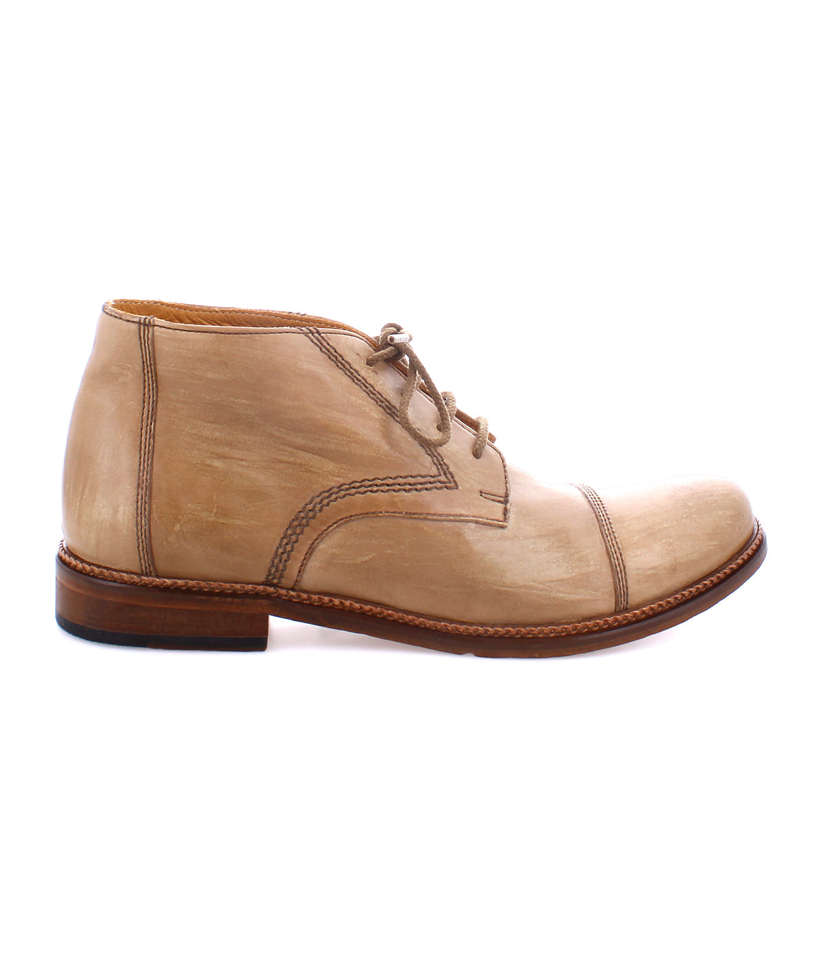 A side view of a beige handcrafted leather dress shoe with brown stitching and a wooden sole. The Bed Stu Scoot, resembling an Italian lace-up boot, features laces and a refined cap toe design.