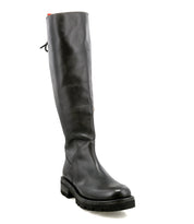 The Bed Stu Scope is a tall women's boot in black, made from vegetable-tanned leather with a chunky sole and slight heel, shown at an angle on a white background.
