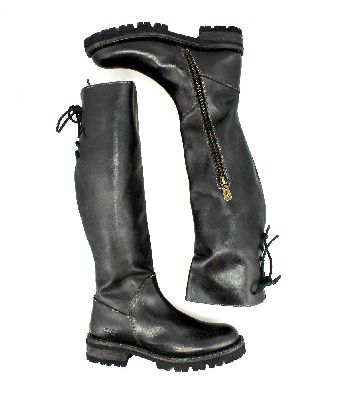 Bed Stu’s Scope: black tall women’s boots in vegetable-tanned leather, with side zippers, lace-up back detail, and chunky rubber soles—shown from side and back.
