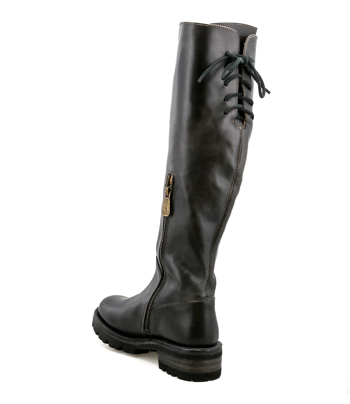 The Bed Stu Scope is a black, knee-high women’s boot with a side zipper and lace-up back, crafted from vegetable-tanned leather. Shown from the rear on a white background.