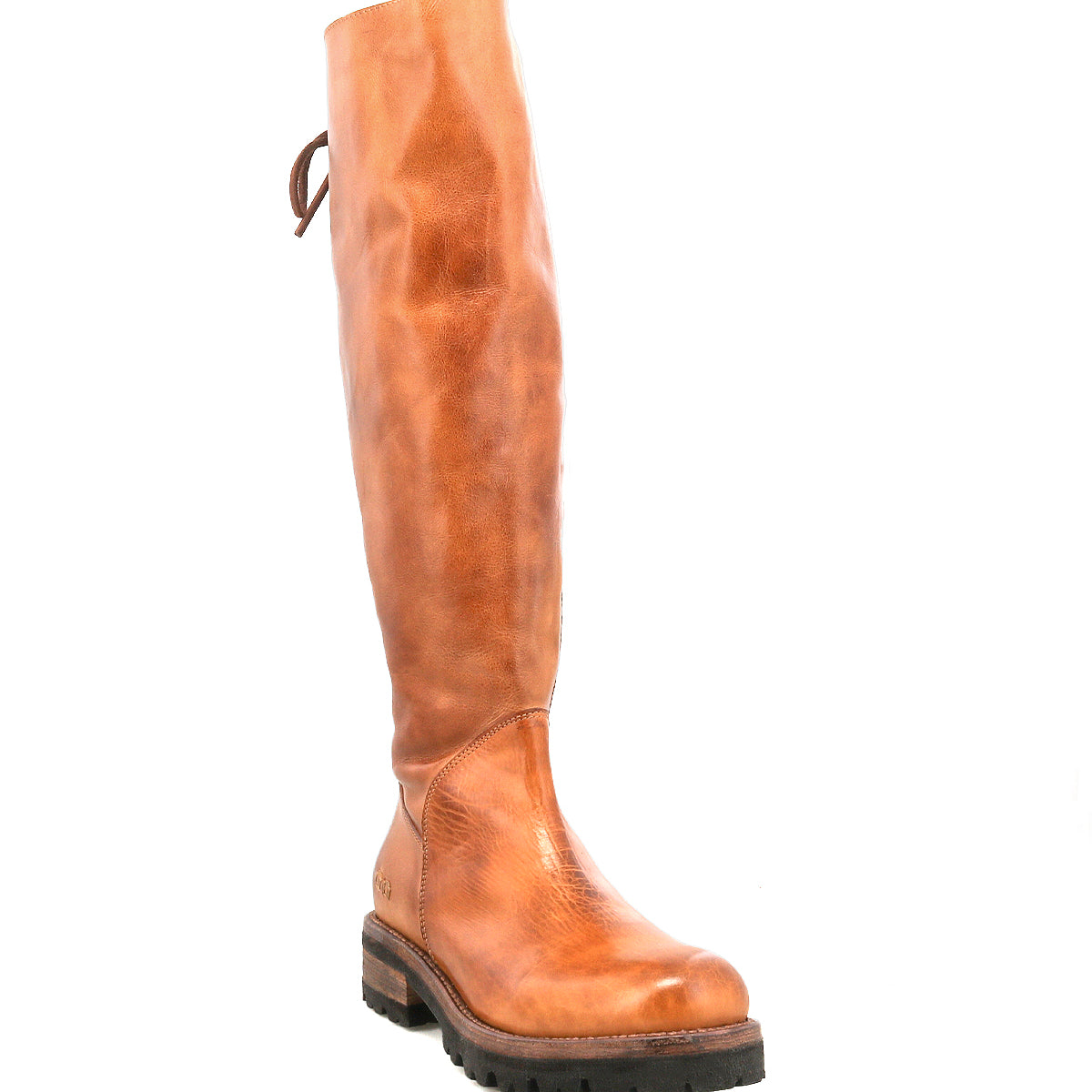 The Bed Stu Scope is a tall women's boot crafted from vegetable-tanned leather, featuring a low black rubber heel and rounded toe, shown standing upright against a white background.