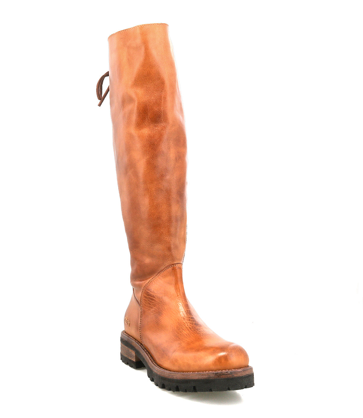 The Bed Stu Scope is a tall women's boot crafted from vegetable-tanned leather, featuring a low black rubber heel and rounded toe, shown standing upright against a white background.