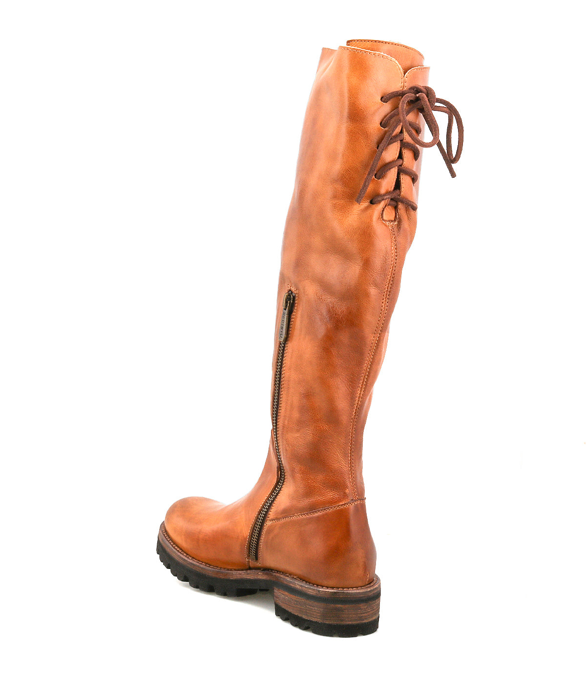 The Bed Stu Scope is a tall women’s boot crafted from vegetable-tanned leather, featuring a side black zipper, brown lace-up back, and thick treaded sole, displayed on a white background.
