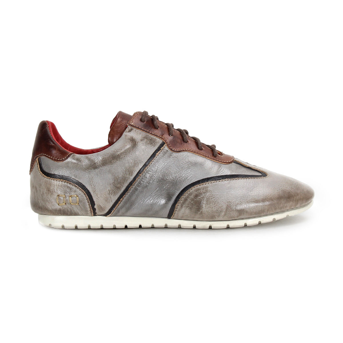The Bed Stu Scurry is a women’s shoe in gray and brown vegetable-tanned leather, with a white sole, brown laces, and red interior lining, shown from the side.