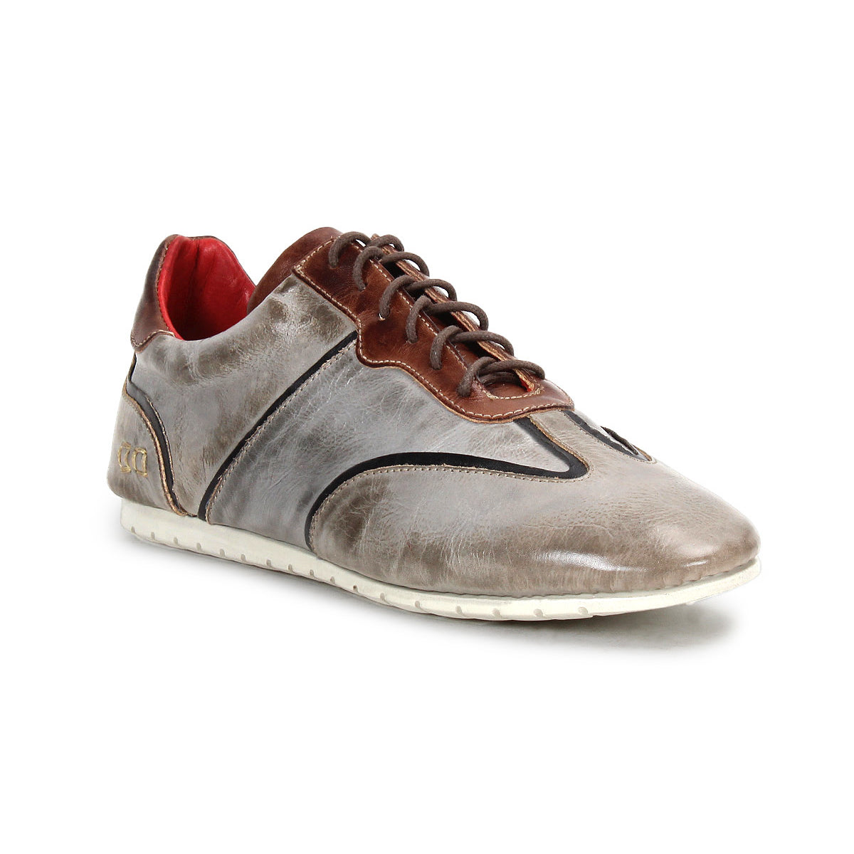 The Bed Stu Scurry is a gray and brown women’s shoe in vegetable-tanned leather, with black trim, red lining, brown laces, and a white rubber sole—shown here at a three-quarter angle.