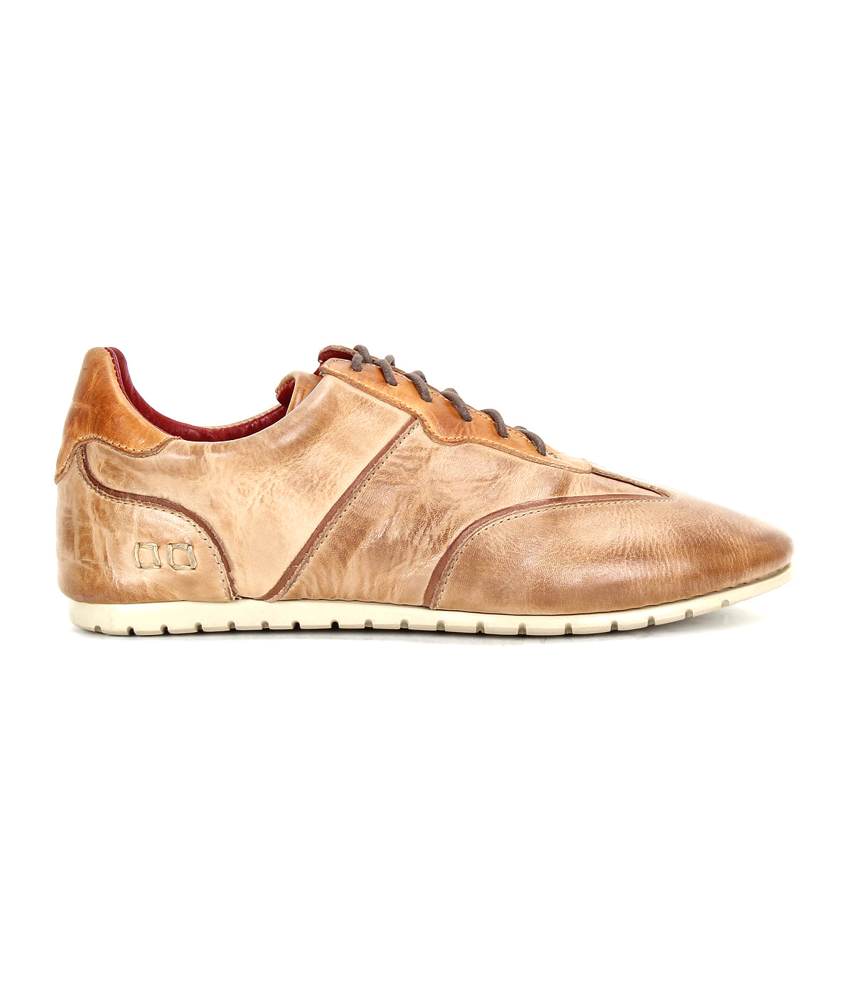 The Bed Stu Scurry is a women’s shoe crafted from vegetable-tanned leather with brown laces, side stitching, and a white rubber sole, shown in profile against a white background.
