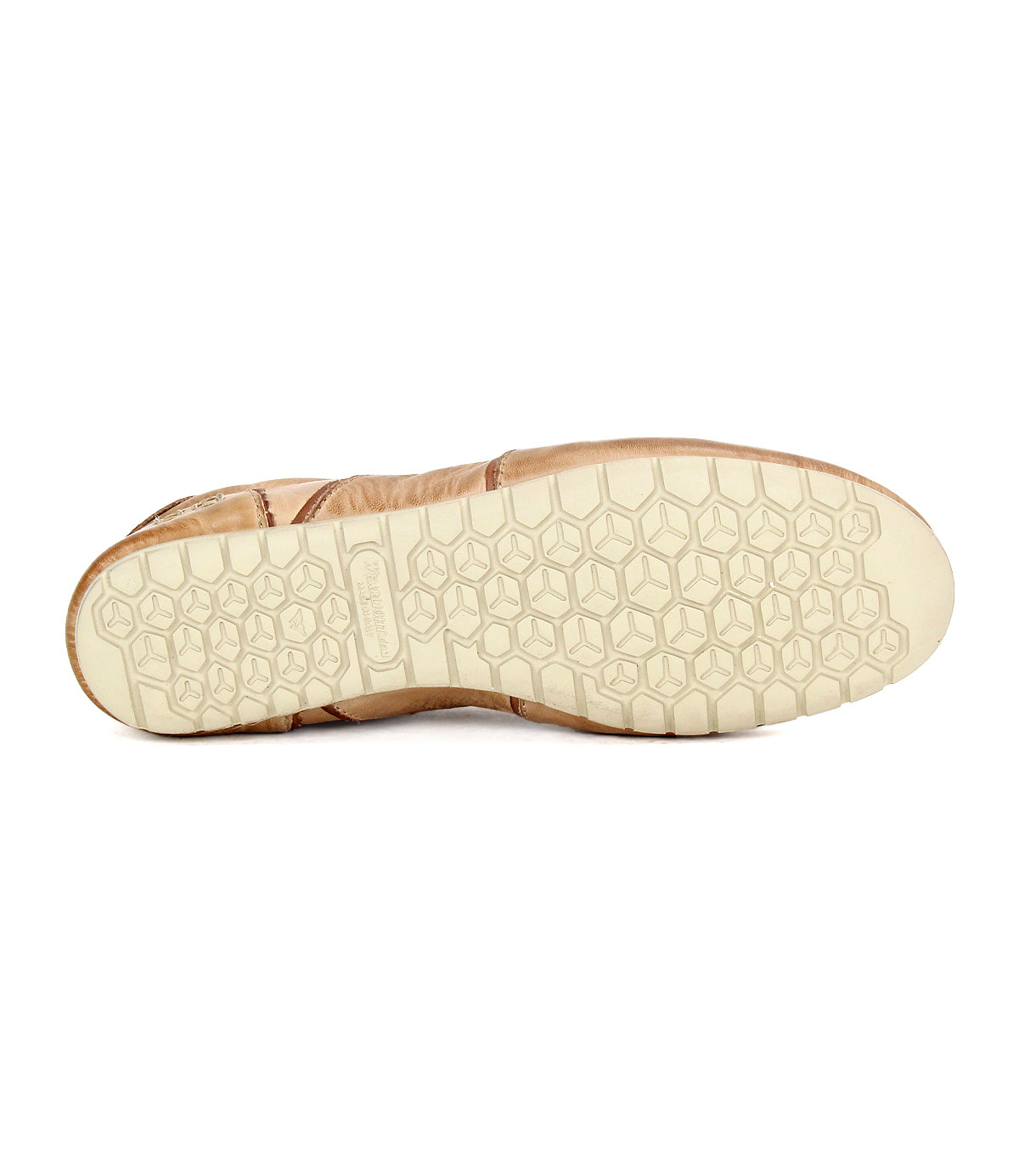 The image shows the beige sole of the Bed Stu Scurry women's shoe, featuring a hexagonal tread pattern and viewed from the bottom.
