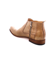 Bed Stu Seek vegetable-tanned leather ankle boot with a side zipper and wooden sole, shown from a rear side angle, showcasing the artisanal craftsmanship.