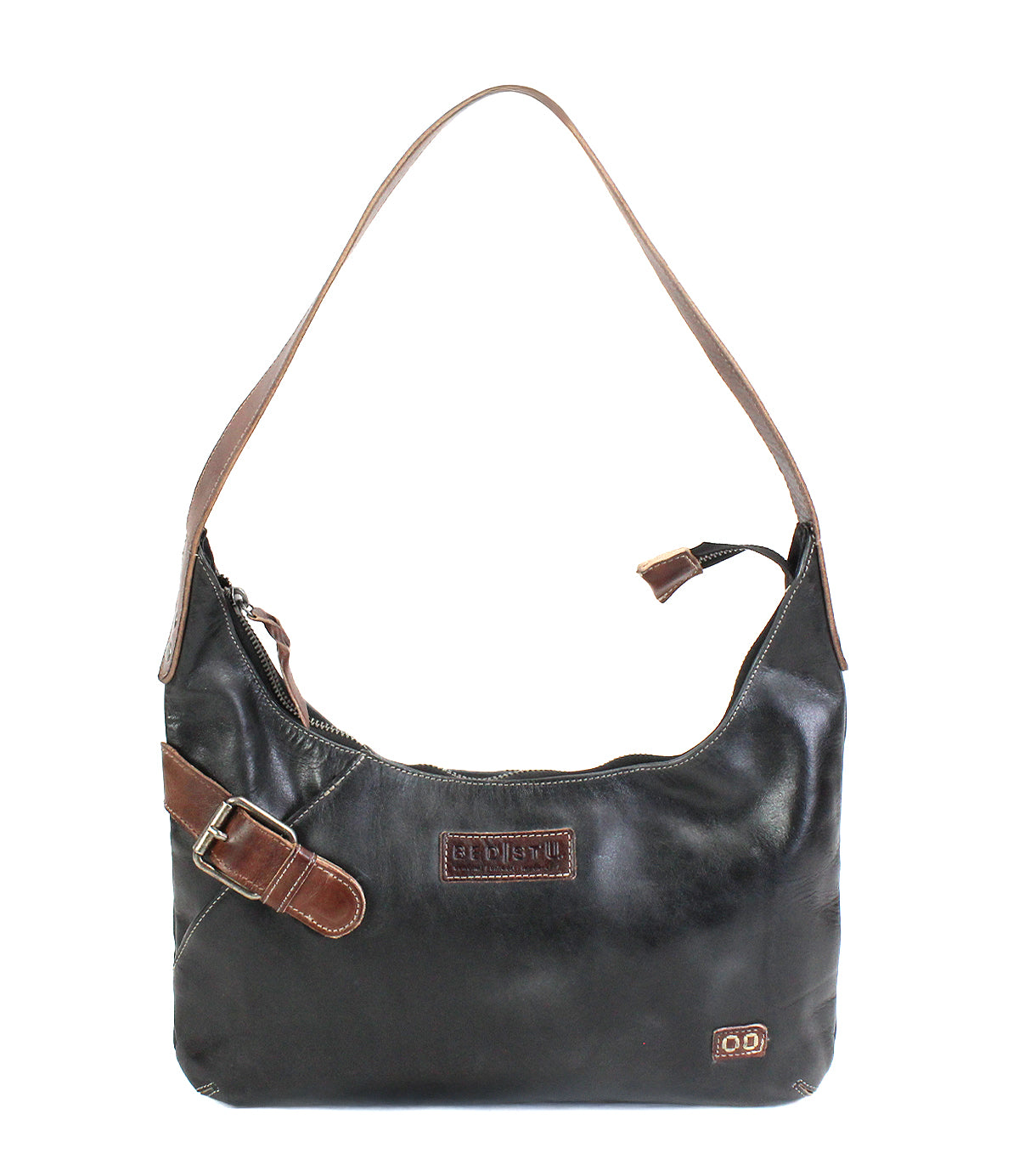 The Bed Stu Seemly is a compact black leather bag with a brown strap, everyday style, an elegant front buckle detail, and a secure zippered closure.