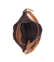 Top view of Bed Stu's Seemly bag in brown leather with buckle detail. Features a spacious fabric-lined interior, zip pocket, and stitched compartments—ideal for everyday style.