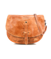 The Bed Stu Sequoia is a light brown vegetable-tanned leather crossbody bag featuring a front flap, buckle strap detail, and adjustable shoulder strap, shown against a white background.