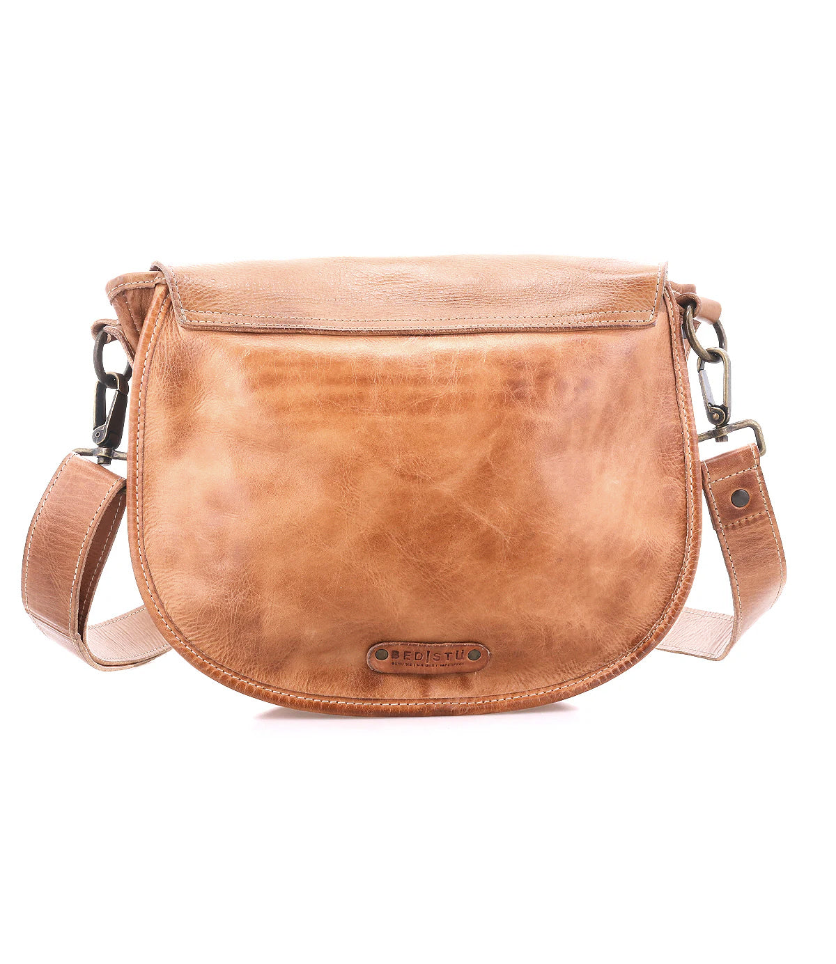 The Sequoia by Bed Stu is a light brown crossbody bag made from vegetable-tanned leather, featuring a curved flap, adjustable strap, and visible stitching.